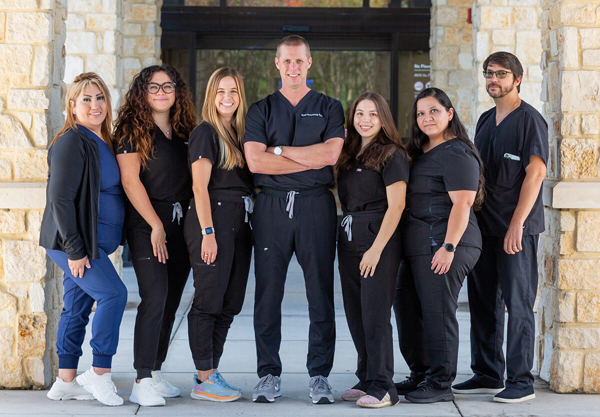 group photo of providers at The Woodlands office